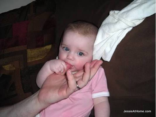 Vero-enjoying-John's-thumb