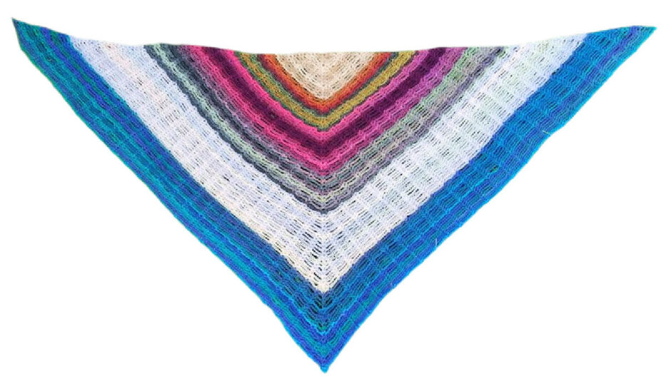 Flat lay view of a triangular crochet shawl with stripes of varying sizes in shades of cream, pink, green, and blue.