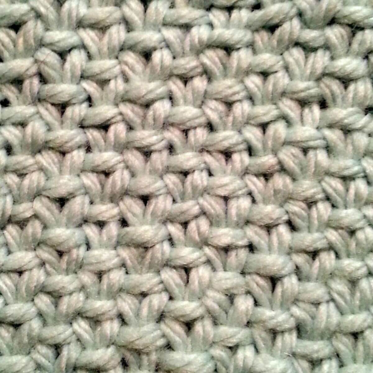 Swatch of knit linen stitch