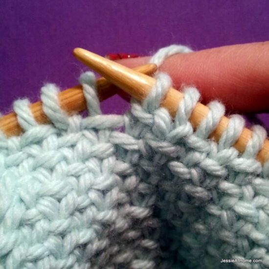 Photo showing step just explained of knit linen stitch.