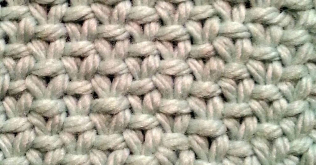 Swatch of knit linen stitch
