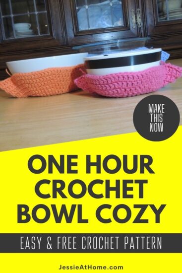 Yellow rectangle with an image at an angle across the top of two bowls with crochet bowl cozies in orange and pink. Over the bottom right side of the image is a black circle with text "Make This Now". Below is text "One Hour Crochet Bowl Cozy", "Easy & Free Crochet Pattern", and "Jessie At Home Dot Com"
