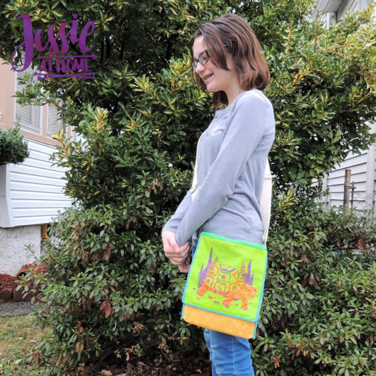 Embroidered messenger sales bag