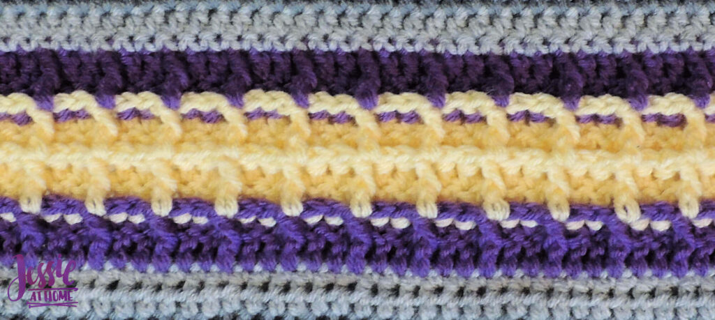 Crochet Waffle Stitch in purple and yellow with grey on top and bottom