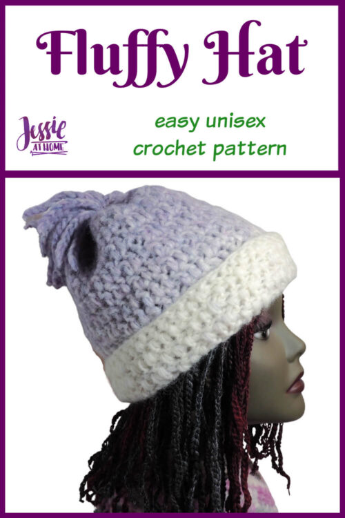 A white vertical image with a purple boarder and a picture of a mannequin head with a hat that is purple with a white stripe across the bottom. There is a tassel on top. On the top are the words "Fluffy Hat" written in purple, under that are the words "Easy unisex crochet pattern" in green. To the left of that is "Jessie at Home" in purple.