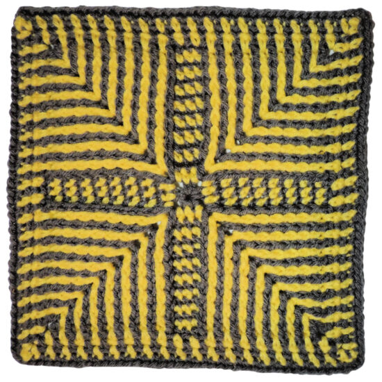Gray and yellow crochet square with angled stripes pointing in from corners made with post stitches.
