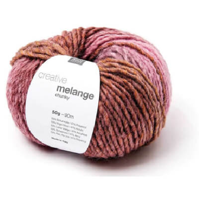 One ball of Rico Design Creative Melange Chunky in pinks and light browns